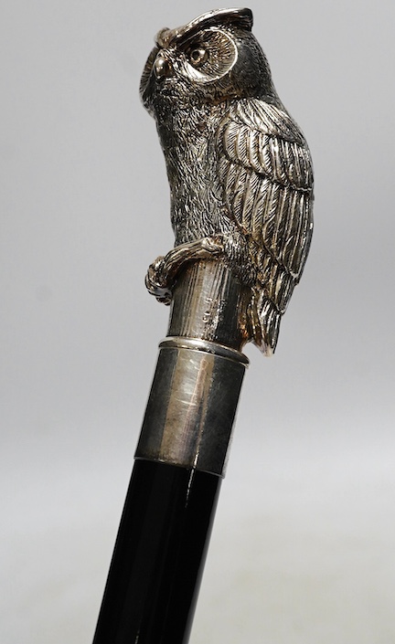 A modern 925 mounted 'owl' walking cane, 95cm. Condition - some light scratching